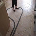 Kayti stands in the middle of the kitchen loop