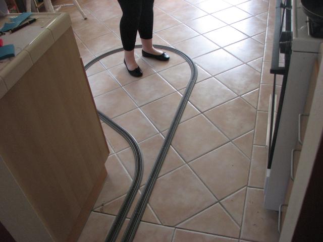 Kayti stands in the middle of the kitchen loop
